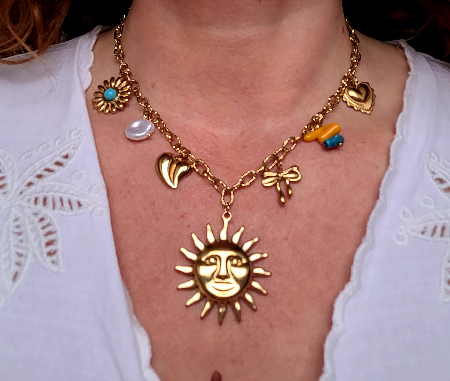 Collier breloques soleil