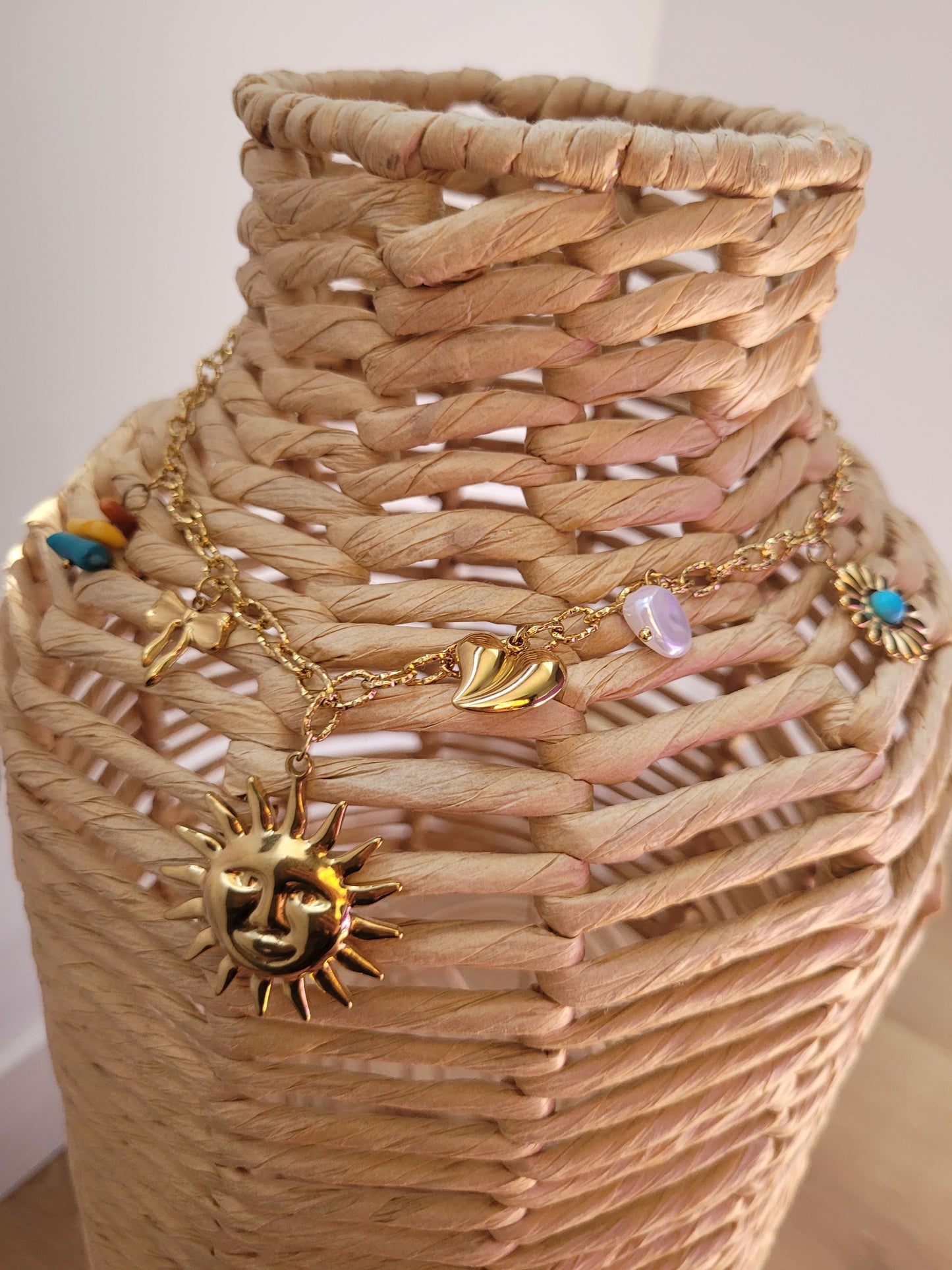 Collier breloques soleil